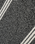 Tapis noir à motifs chevrons blancs 160 x 230 cm AIDA