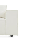 Canapé d'angle fixe modulable avec 1 pouf en tissu effet peau de mouton blanc écru HARLEM XL